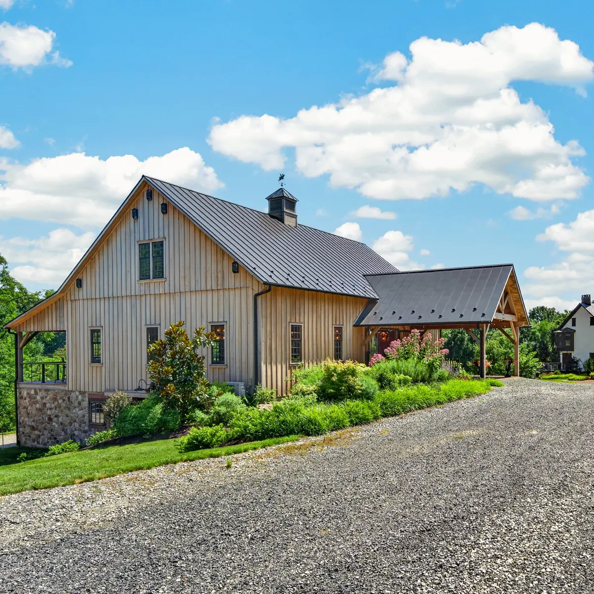 The Barn and Farmhouse viewed together from the drive